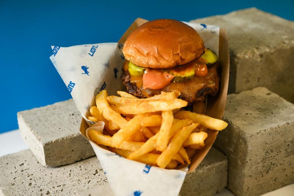 Smash Burgers with fries are a new food item available to Detroit Lions fans at Ford Field.