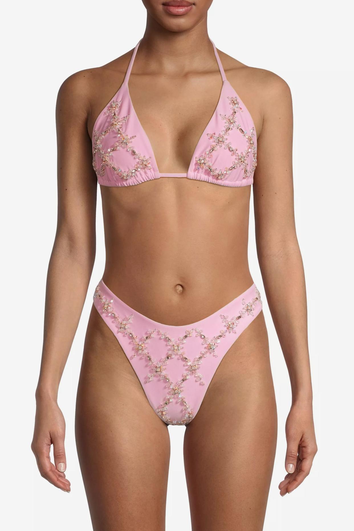 <p><a href="https://go.skimresources.com?id=74968X1525074&xs=1&url=https%3A%2F%2Fwww.saksfifthavenue.com%2Fproduct%2FOceanus-Rose-Hand-Embroidered-Bikini-0400020443178.html" rel="noopener" target="_blank" data-ylk="slk:Shop Now;elm:context_link;itc:0;sec:content-canvas" class="link rapid-noclick-resp">Shop Now</a></p><p>Rose Hand swimsuit</p><p>saksfithavenue.com</p><p>$250.00</p>