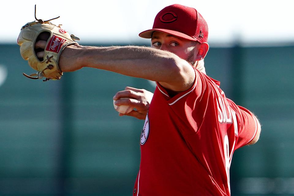 Cincinnati Reds pitcher Jared Solomon (87) delivers during live batting practice, Tuesday, March 15, 2022, at the baseball team's spring training facility in Goodyear, Ariz.