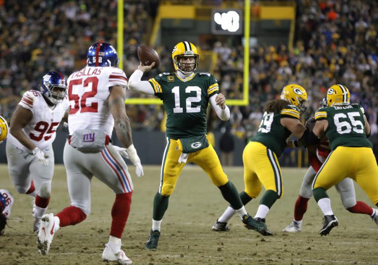 Aaron Rodgers completed a Hail Mary at the end of the first half against the Giants. (AP)