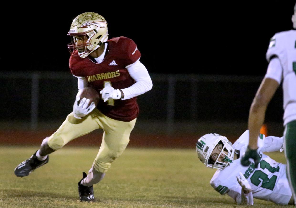 Riverdale's Keshawn Williams (4) catches a pass and runs the ball during the football playoff game against Green Hill at Riverdale, on Friday, Nov 3, 2023.
