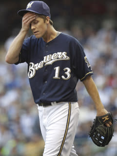 Brewers pitcher Zack Greinke walks off the mound after the fifth inning of Game 1 of the NLCS. He was the winning pitcher despite allowing six runs in six innings