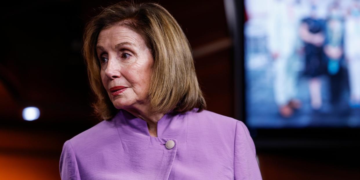 US Speaker of the House Nancy Pelosi in a purple suit.