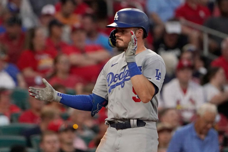 Los Angeles Dodgers' Gavin Lux celebrates as he arrives home after hitting a two-run home run during the seventh inning of a baseball game against the St. Louis Cardinals Thursday, July 14, 2022, in St. Louis. (AP Photo/Jeff Roberson)