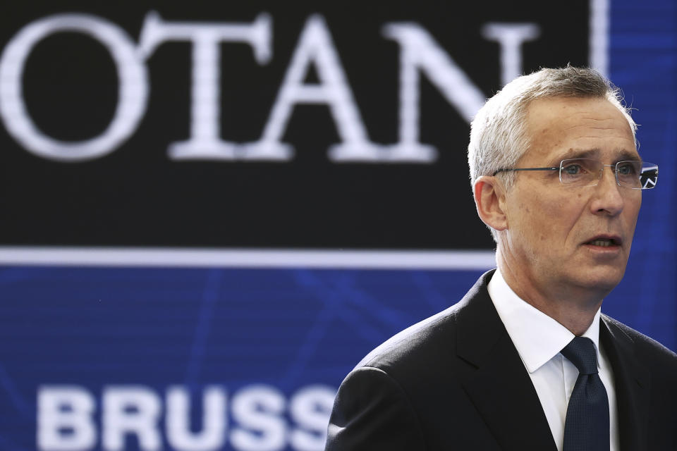 NATO Secretary General Jens Stoltenberg speaks with the media as he arrives for a NATO summit at NATO headquarters in Brussels, Monday, June 14, 2021. U.S. President Joe Biden is taking part in his first NATO summit, where the 30-nation alliance hopes to reaffirm its unity and discuss increasingly tense relations with China and Russia, as the organization pulls its troops out after 18 years in Afghanistan. (Kenzo Tribouillard, Pool via AP)