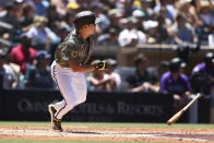 San Diego Padres' Ha-Seong Kim watches his RBI-double to left against the Colorado Rockies in the first inning of a baseball game Sunday, Aug. 1, 2021, in San Diego. Padres' Jake Cronenworth and Wil Myers scored on the play. (AP Photo/Derrick Tuskan)