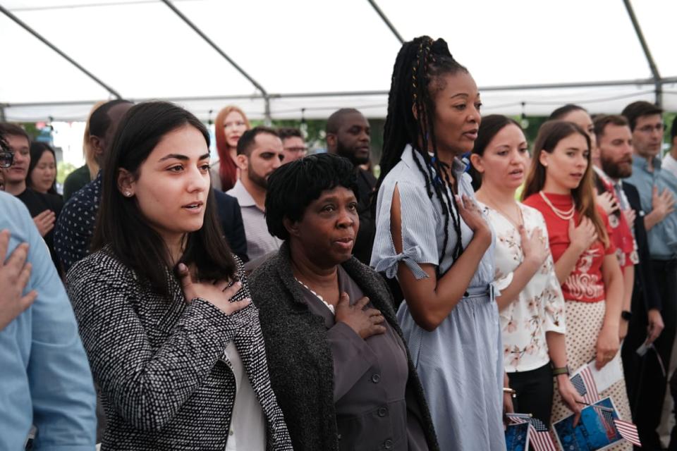 <div class="inline-image__caption"><p>People from a total of 27 nations participate in a Naturalization Ceremony in Brooklyn on June 14, 2019 in New York City.</p></div> <div class="inline-image__credit">Spencer Platt/Getty Images</div>