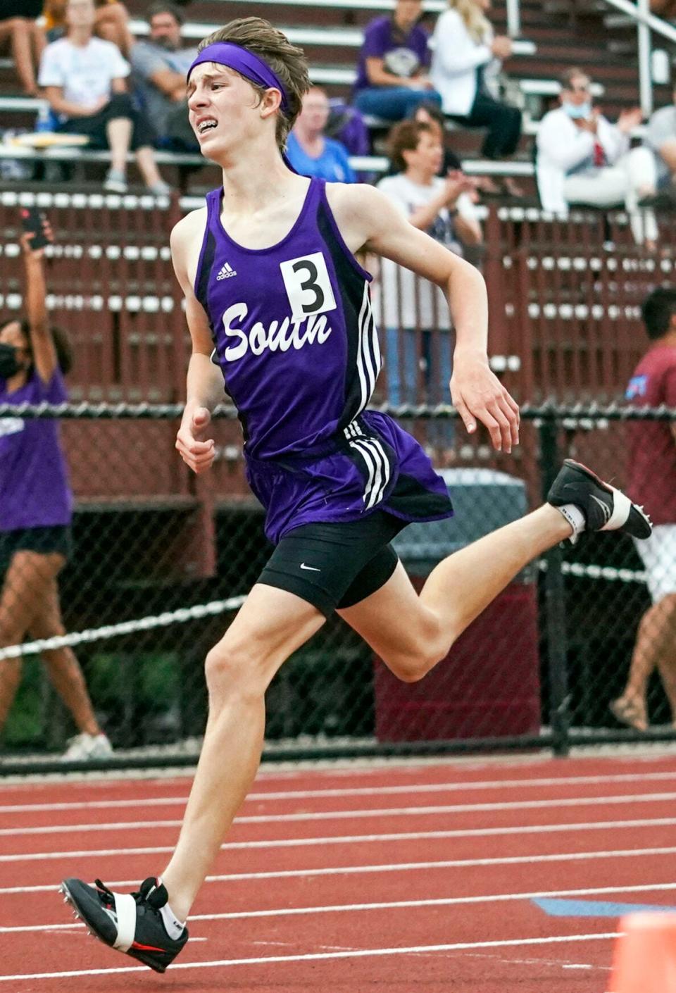 Bloomington South freshman Ryan Rheam races to a second place finish in the 3,200 meter run at the 2022 Bloomington North boys' track and field regional. He finished in 9:43.05 as less than a second separated second and fourth.