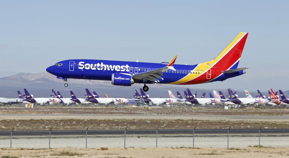 FILE - In this March 23, 2019, file photo, a Southwest Airlines Boeing 737 Max aircraft lands at the Southern California Logistics Airport in the high desert town of Victorville, Calif. Southwest Airlines Co. reports earns on Thursday, April 25. (AP Photo/Matt Hartman, File)