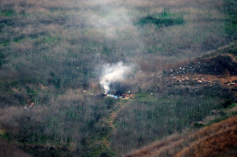 Smoke rises from the scene of a helicopter crash that reportedly killed retired basketball star Kobe Bryant in Calabasas