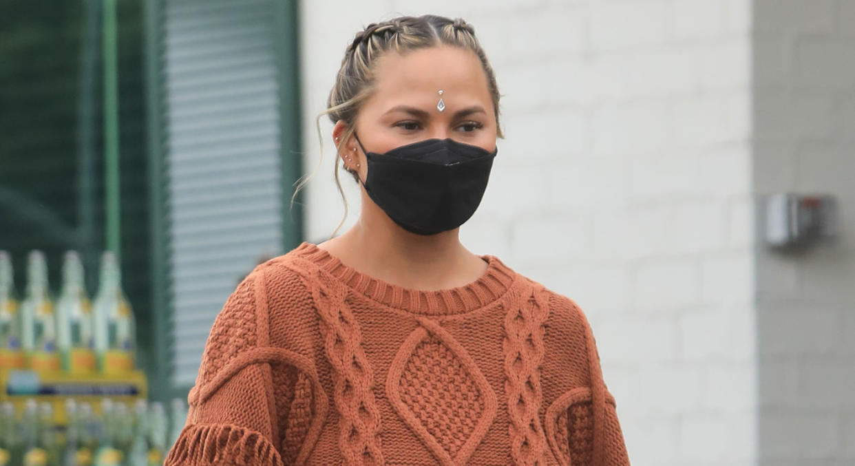 Chrissy Teigen has put together a collection of face masks over the last few months.  (Getty Images)