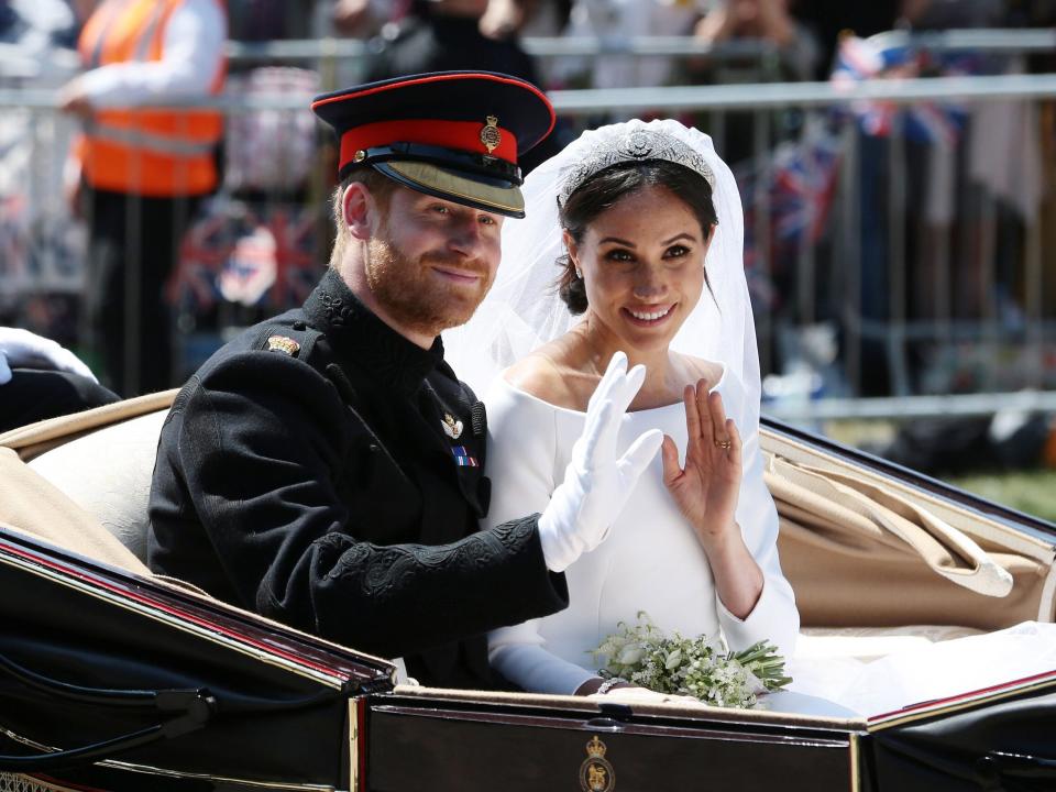 meghan markle and prince harry in their wedding carriage