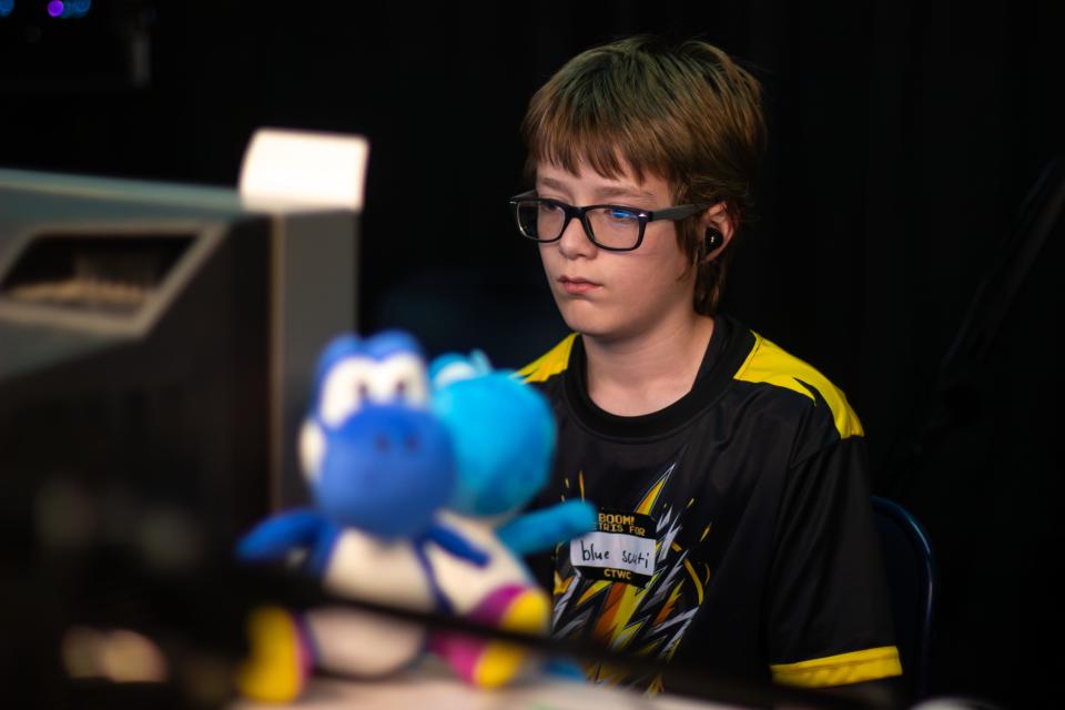 Willis Gibson, 13, of Stillwater, Okla., at the recent 2023 Classic Tetris World Championship in October 2023, where he took third place. Two months later, he became the first player to beat Tetris by crashing the video game.