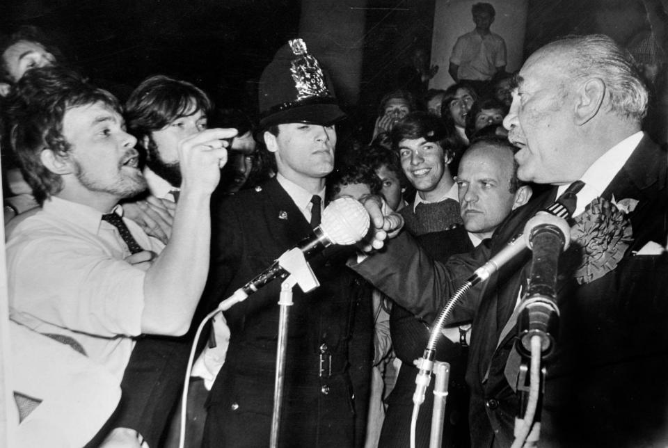 A victorious Frank Judd, second right, looks on as a protester berates the unseated Tory Brigadier Terence Clarke during the 1966 general election  - MIKE WALKER/Alamy 