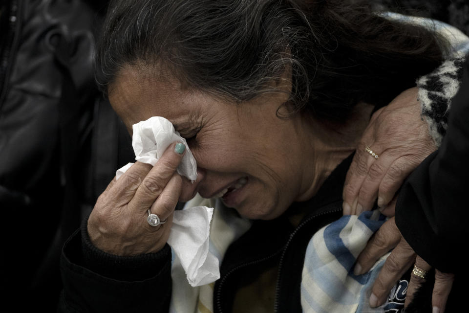 A relative of Matan Elmaliach, 26, reacts during his funeral in the West Bank settlement of Maale Adumim, Thursday, Feb. 22, 2024. Israel police said three Palestinian gunmen opened fire on the road near the settlement, killing Elmaliach and wounding at least eight; security forces on the site killed two of the gunmen, and a third was found during searches of the area afterwards and was detained. (AP Photo/Maya Alleruzzo)