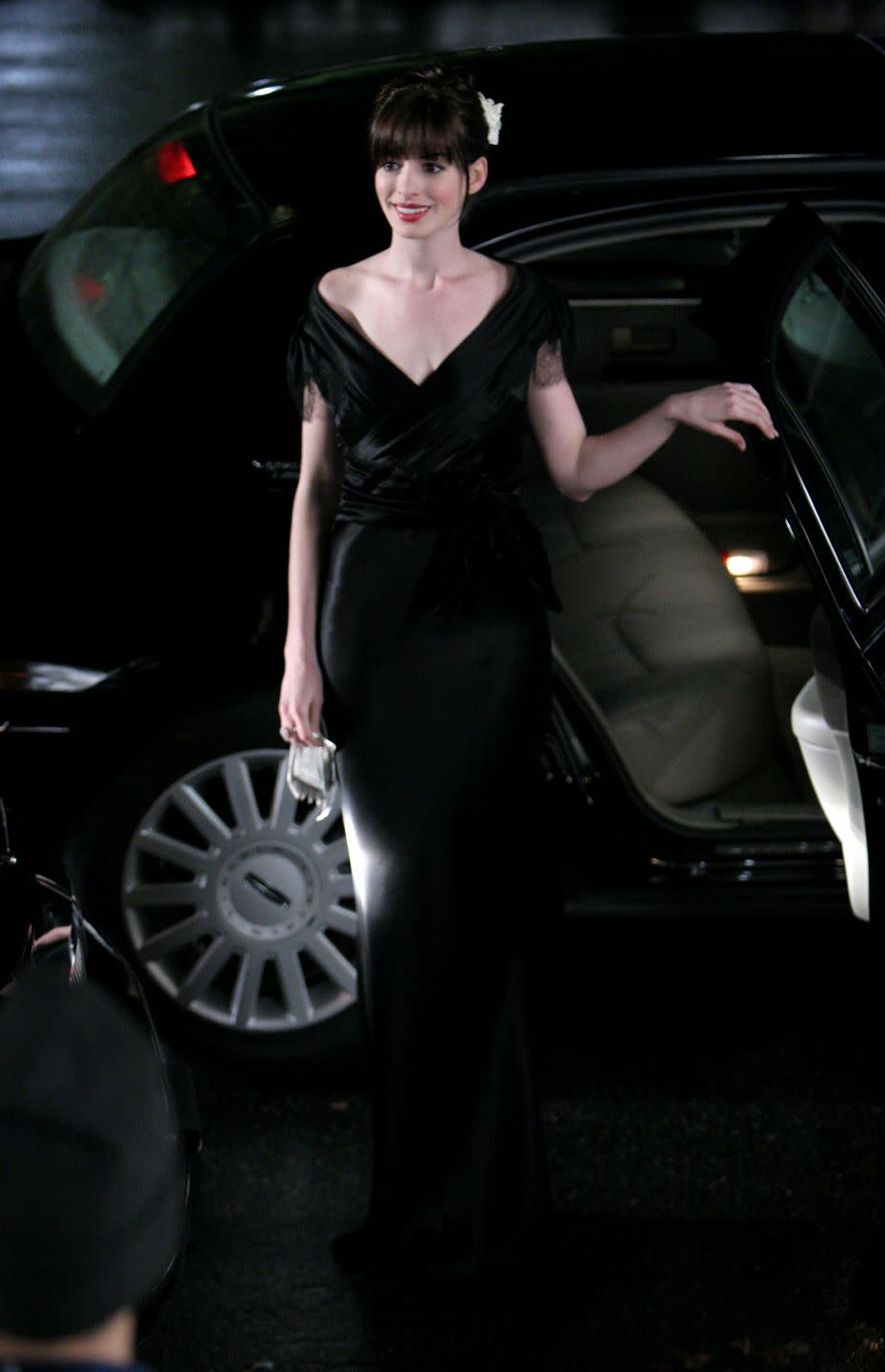 <p>Throughout <em>The Devil Wears Prada, </em>we see Andrea Sachs transition from anti-fashion to the bon vivant who scored a pair of the new Chanel boots. But the outfit that stood out most from the movie (post-makeover, of course) is the black silk Valentino gown she wears to <em>Runway</em>'s charity gala.  </p>