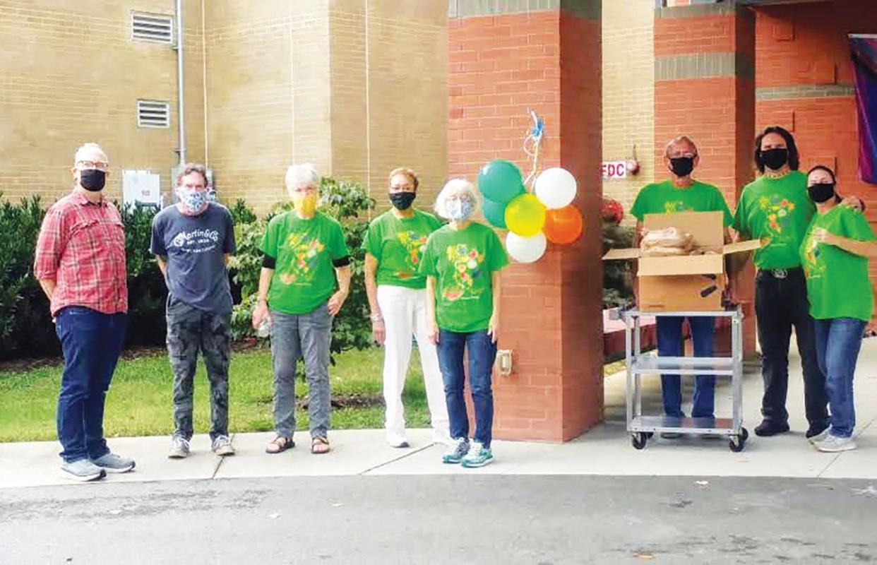 Oak Ridge Unitarian Universalist Church volunteers are ready to serve diners at takeout drive-through community meal. The next one is Friday, Oct. 29, 2021.