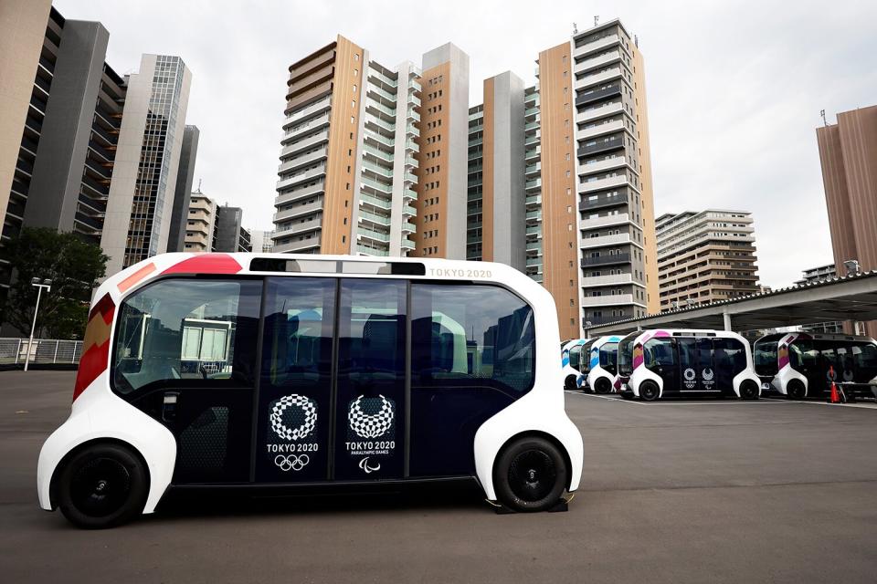 Toyota Motor Corp. e-Palette vehicles at the internal shuttle bus station during a media tour at the Olympic and Paralympic Village for the Tokyo 2020 Games, constructed in the Harumi waterfront district of Tokyo, Japan, on Sunday, June 20, 2021.