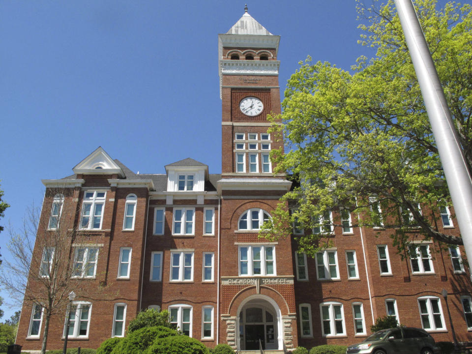 Tillman Hall on the campus of Clemson University is seen on Monday, April 18, 2016, in Clemson, SC. Students have spent a week at Sikes Hall, calling for Clemson to be more diverse, including changing the name of Tillman Hall. Clemson trustees voted last Friday to ask the General Assembly to let it change the name of Tillman Hall, a main building on campus named for “Pitchfork” Ben Tillman. (AP Photo/Jeffrey Collins, File)