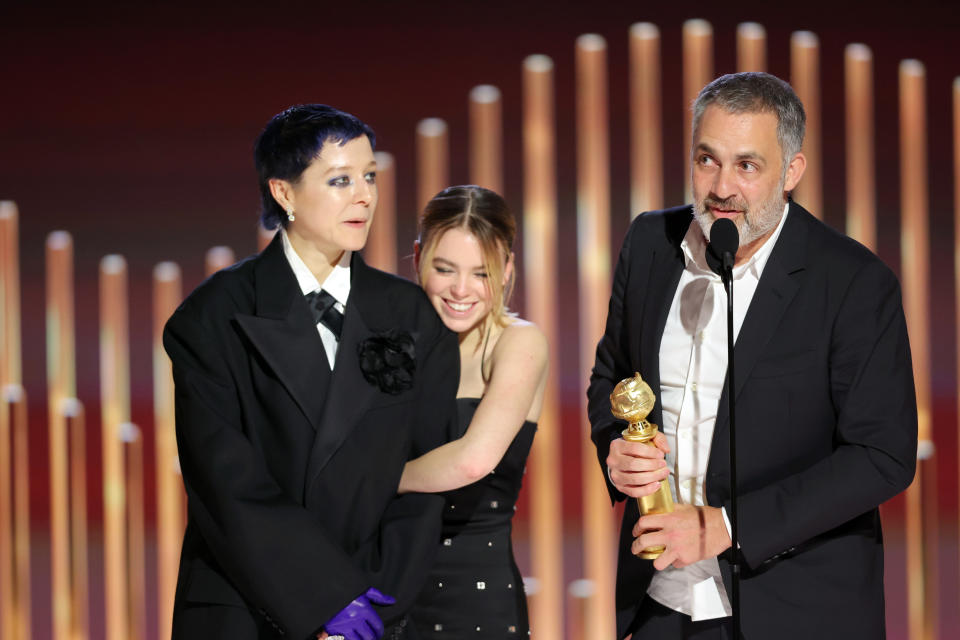 BEVERLY HILLS, CALIFORNIA - JANUARY 10: 80th Annual GOLDEN GLOBE AWARDS -- Pictured: (L-R) Emma D’Arcy, Milly Alcock, and Miguel Sapochnik accept the Best Television Series – Drama award for 