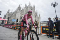 Australia's Jai Hindley rides past the gothic cathedral after compelting the final stage of the Giro d'Italia cycling race, a 15.7 kilometers (9.756 miles) individual time trial from Cernusco sul Naviglio to Milan, Italy, Sunday, Oct. 25, 2020. (AP Photo/Luca Bruno)