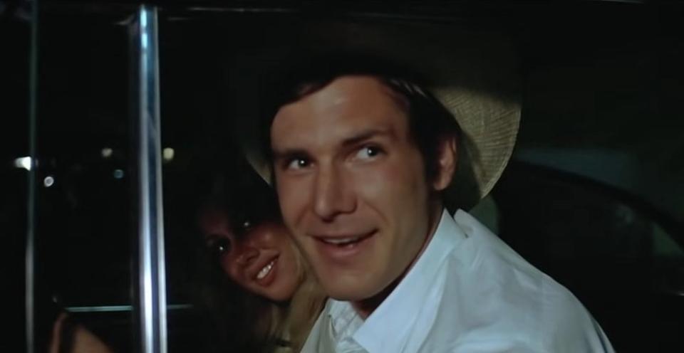 Bob Falfa with a woman in his car in "American Grafitti"