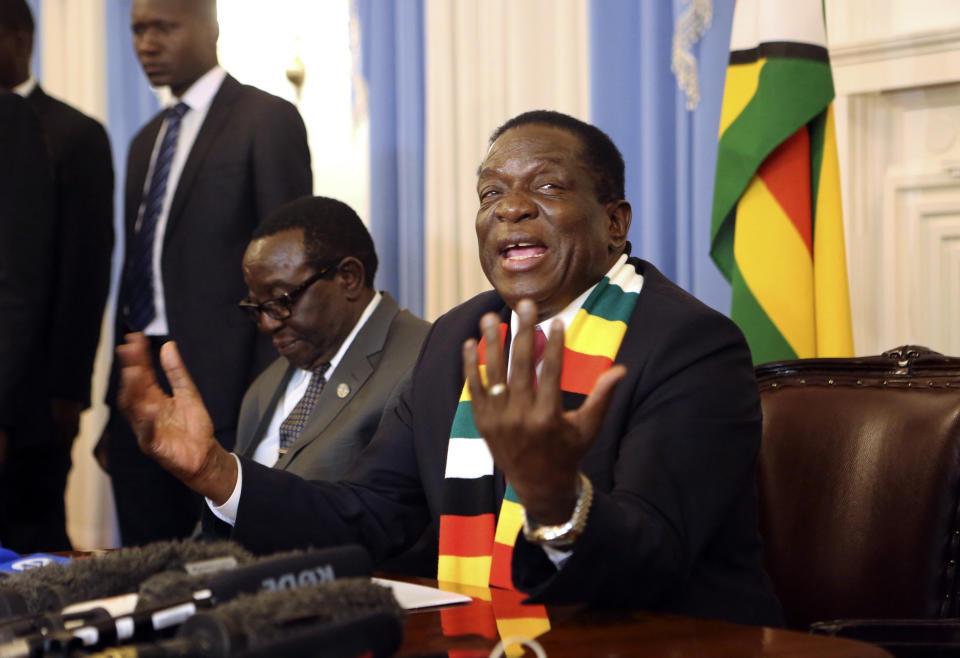 Zimbabwean President elect Emmerson Mnangagwa addresses a press conference in Harare, Friday, Aug, 3, 2018. Zimbabwe's president says people are free to approach the courts if they have issues with the results of Monday's election, which he carried with just over 50 percent of the vote. President Emmerson Mnangagwa spoke to journalists shortly after opposition leader Nelson Chamisa called the election results manipulated and said they would be challenged in court. (AP Photo/Tsvangirayi Mukwazhi)