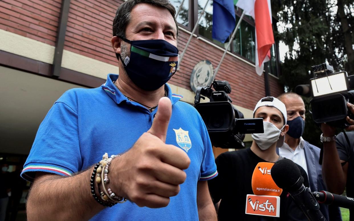 The leader of Italy's far-right League party Matteo Salvini gestures after casting his ballot on a referendum to sanction a proposed cut in the number of Italian parliamentarians - FLAVIO LO SCALZO /REUTERS