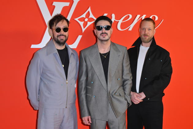 Ben Lovett, Marcus Mumford and Ted Dwane of Mumford and Sons attend the Louis Vuitton Menswear Fall/Winter 2024-2025.  - Credit: Kristy Sparow/Getty Images