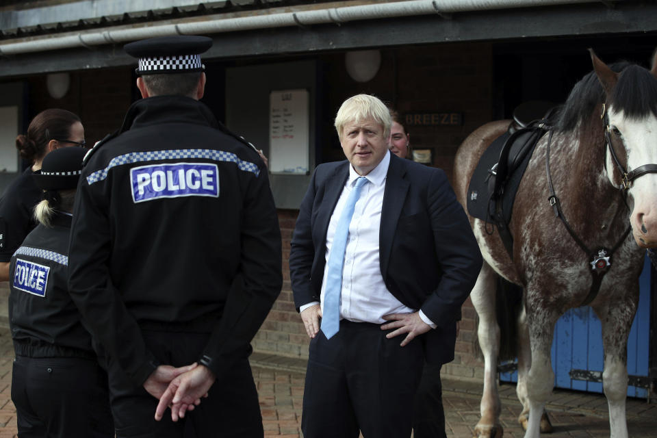Britain's Prime Minister Boris Johnson looks on during a visit to West Yorkshire in England, Thursday, Sept. 5, 2019. Prime Minister Boris Johnson kept up his push Thursday for an early general election as a way to break Britain's Brexit impasse, as lawmakers moved to stop the U.K. leaving the European Union next month without a divorce deal. (Danny Lawson/PA via AP)