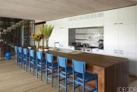 <p>In a sophisticated home in the Hamptons, the kitchen barstools are by Etel Carmona for <a rel="nofollow noopener" href="http://www.espasso.com" target="_blank" data-ylk="slk:Espasso;elm:context_link;itc:0;sec:content-canvas" class="link ">Espasso</a>, the matte lacquer cabinetry is custom made, the sink fittings are by <a rel="nofollow noopener" href="http://www.kallista.com/home.kls" target="_blank" data-ylk="slk:Kallista;elm:context_link;itc:0;sec:content-canvas" class="link ">Kallista</a> and the range is by <a rel="nofollow noopener" href="http://www.subzero-wolf.com/sub-zero" target="_blank" data-ylk="slk:Wolf;elm:context_link;itc:0;sec:content-canvas" class="link ">Wolf</a>.<br></p>