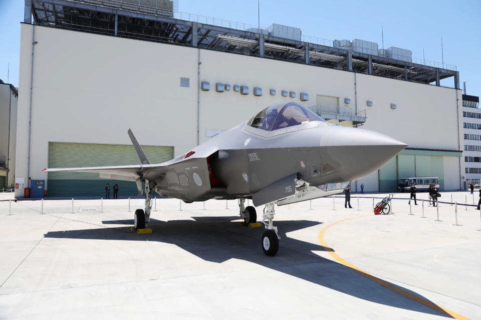 This picture taken on June 5, 2017 shows the first F-35A stealth fighter assembled in Japan, unveiled at a Mitsubishi Heavy Industries factory in Toyoyama, Aichi Prefecture. / AFP PHOTO / JIJI PRESS / STR / Japan OUT        (Photo credit should read STR/AFP via Getty Images)