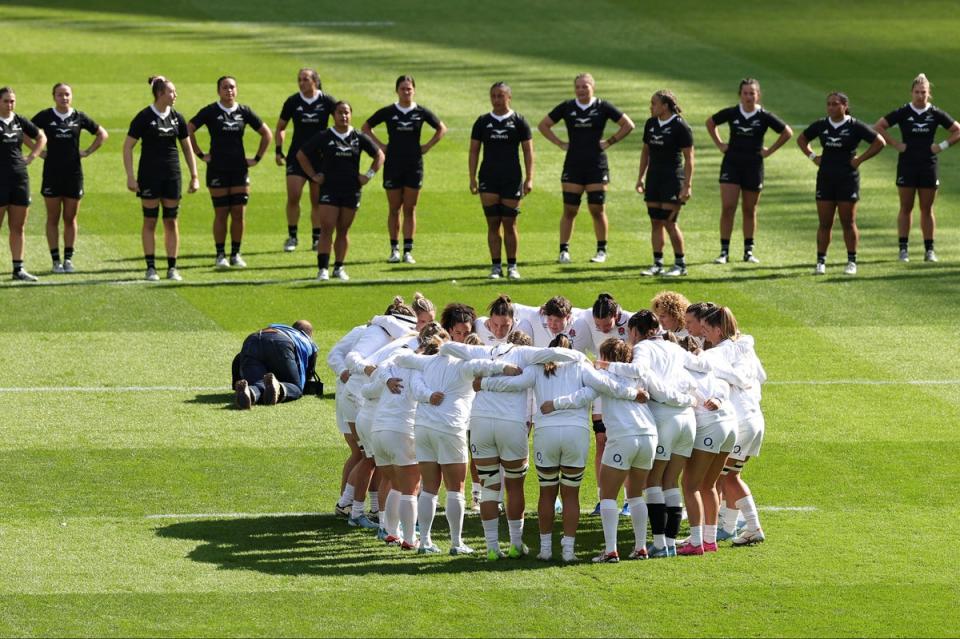 The England team gathers as the New Zealand team perform the Haka during the women's International match between England Red Roses and New Zealand Black Ferns (Getty)