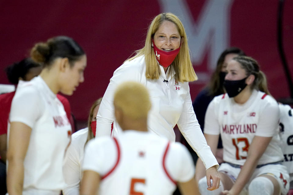 Maryland head coach Brenda Frese reacts during the second half of an NCAA college basketball game against Wisconsin, Thursday, Feb. 4, 2021, in College Park, Md. Frese tied a school record with her 499th win, reaching the milestone by guiding the 10th-ranked Terrapins past Wisconsin 84-48. Frese matched the mark set by Hall of Fame coach Chris Weller, who was at Maryland from 1975-2002. Weller was replaced by Frese, who's 499-130 over 19 seasons. (AP Photo/Julio Cortez)