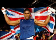 Anthony Joshua of Great Britain celebrates defeating Roberto Cammarelle of Italy to win the Men's Super Heavy ( 91kg) Boxing final bout on Day 16 of the London 2012 Olympic Games at ExCeL on August 12, 2012 in London, England. (Photo by Scott Heavey/Getty Images)