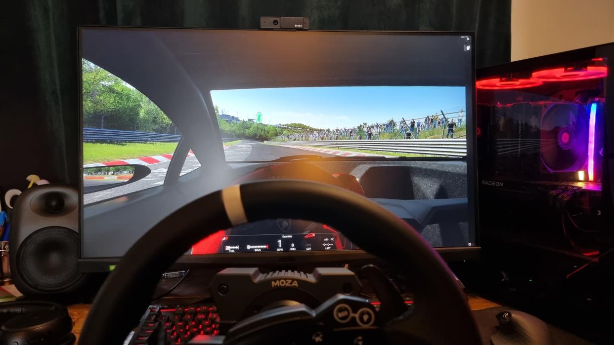  A drivers eye-view of the MOZA R5 being used for some sim racing, with a terrible driver behind the wheel. 