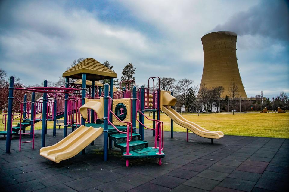 Michigan City Generating Station can be seen from a playground in The Town of Pines. The station is a NIPSCO (Northern Indiana Public Service Company) coal and natural gas-fired power plant located on the shores of Lake Michigan. This playground was recently redone after it was discovered to be built on coal ash.