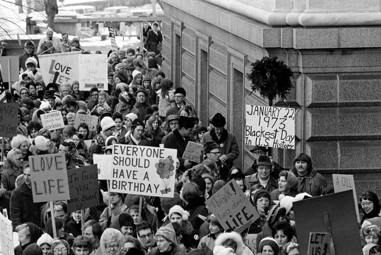 A 1973 photo shows an estimated 5,000 people, women and men, marching around the Minnesota Capitol building protesting the U.S. Supreme Court's Roe v. Wade decision. <a href="https://newsroom.ap.org/detail/MINNEAPOLISANTIABORTIONRALLY/4483f8b574e4da11af9f0014c2589dfb/photo?Query=Minnesota%20Capitol%20building%201973&mediaType=photo&sortBy=&dateRange=Anytime&totalCount=1&currentItemNo=0" rel="nofollow noopener" target="_blank" data-ylk="slk:AP Photo;elm:context_link;itc:0;sec:content-canvas" class="link ">AP Photo</a>