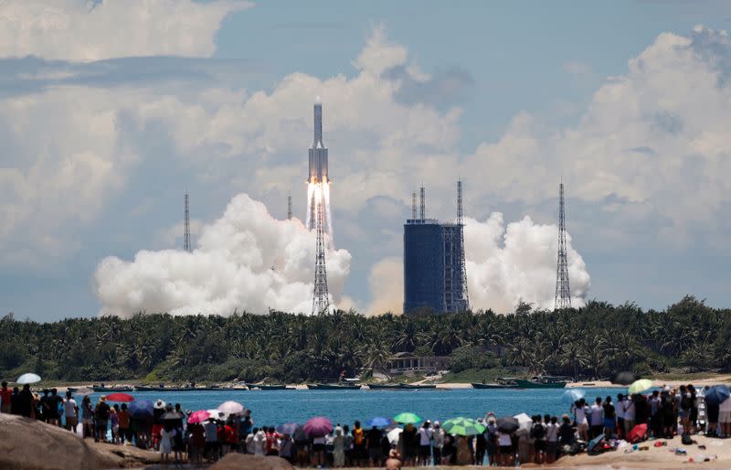FILE PHOTO: The Long March 5 Y-4 rocket, carrying an unmanned Mars probe of the Tianwen-1 mission, takes off from Wenchang Space Launch Center