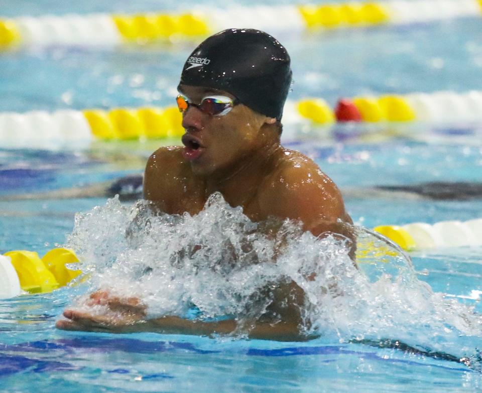 Conrad's Aaron Stevens wins his second event of the night - the 100 yard breaststroke - during the DIAA boys swimming state championships in the Rawstrom Natatorium at the University of Delaware, Saturday, Feb. 25, 2023.