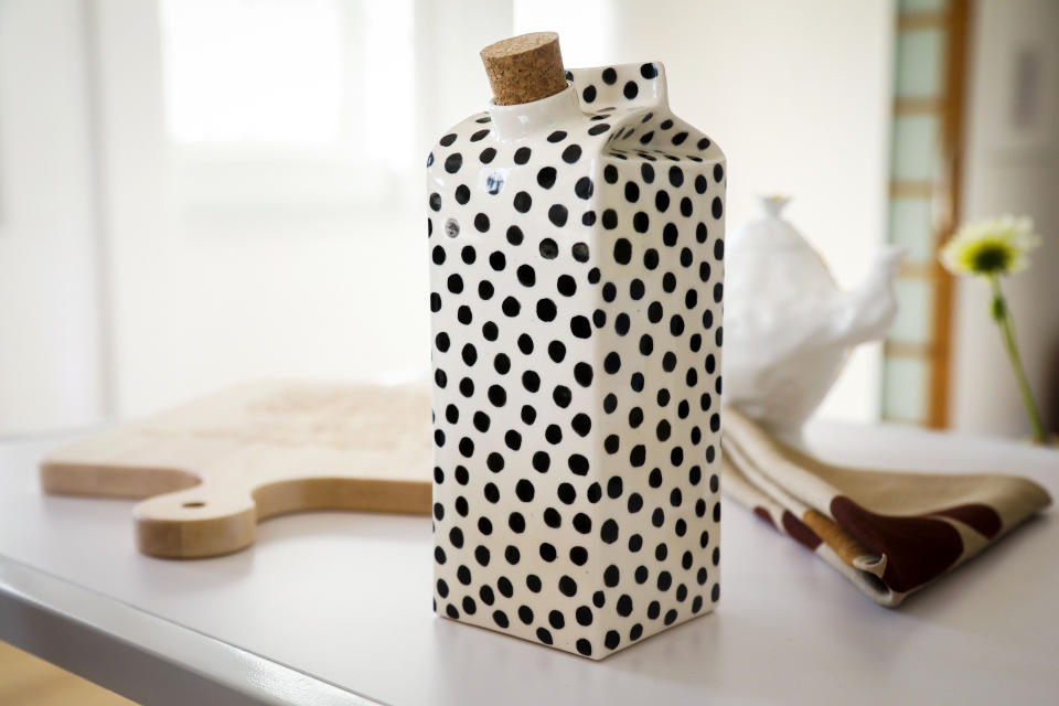 This Sept. 29, 2022 photo shows a ceramic milk carton in a polka dot design from the Etsy shop ZLATNA. Collectibles of all kinds make great holiday gifts. (Photo by Andy Kropa/Invision/AP).