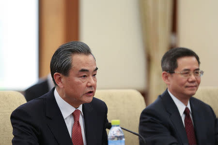 Chinese Foreign Minister Wang Yi (L) meets U.S. Secretary of State Rex Tillerson at Diaoyutai State Guesthouse on March 18, 2017 in Beijing, China. REUTERS/ Lintao Zhang/POOL