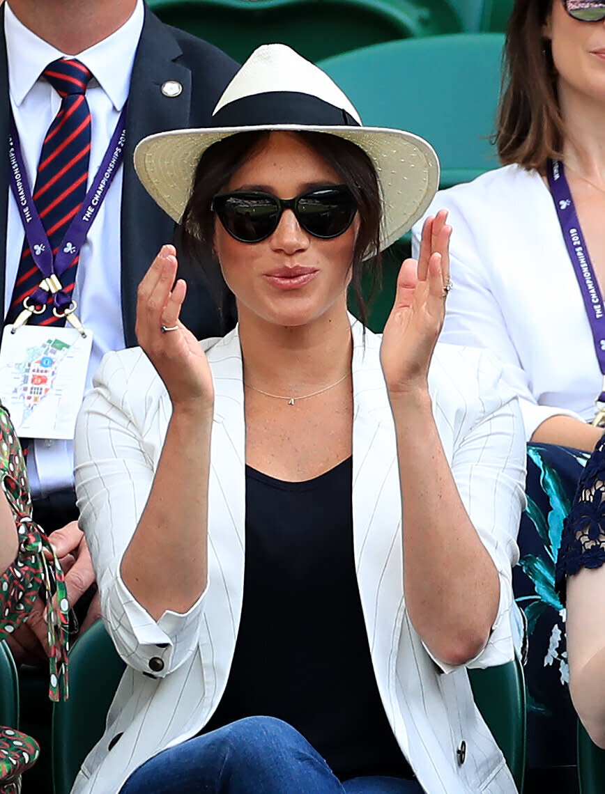 Duchess of Sussex watches Serena Williams at the Wimbledon Championships.