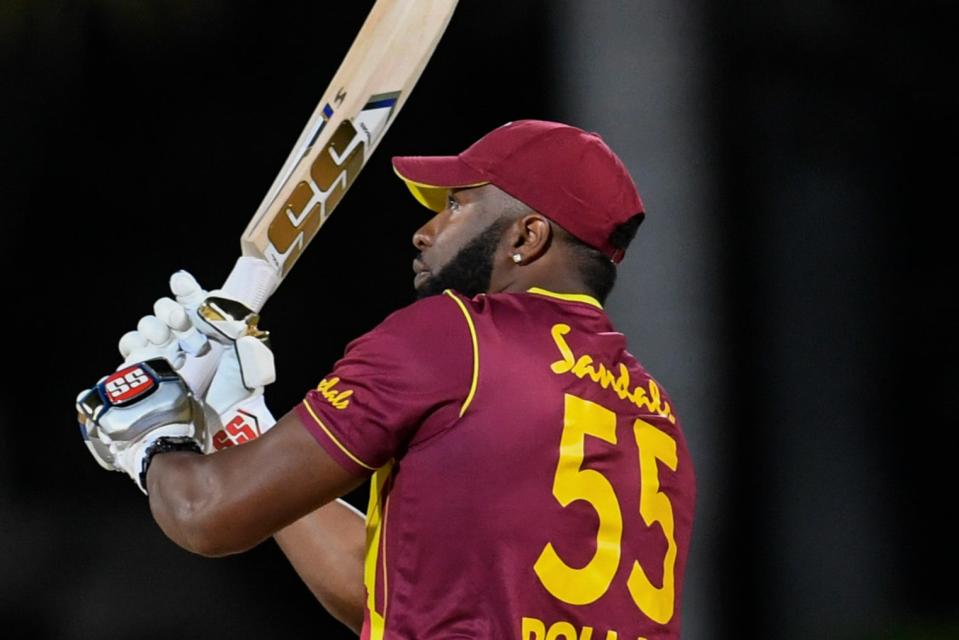 <p>West Indies star Kieron Pollard has joined an exclusive club after his heroics in Antigua </p> (AFP via Getty Images)