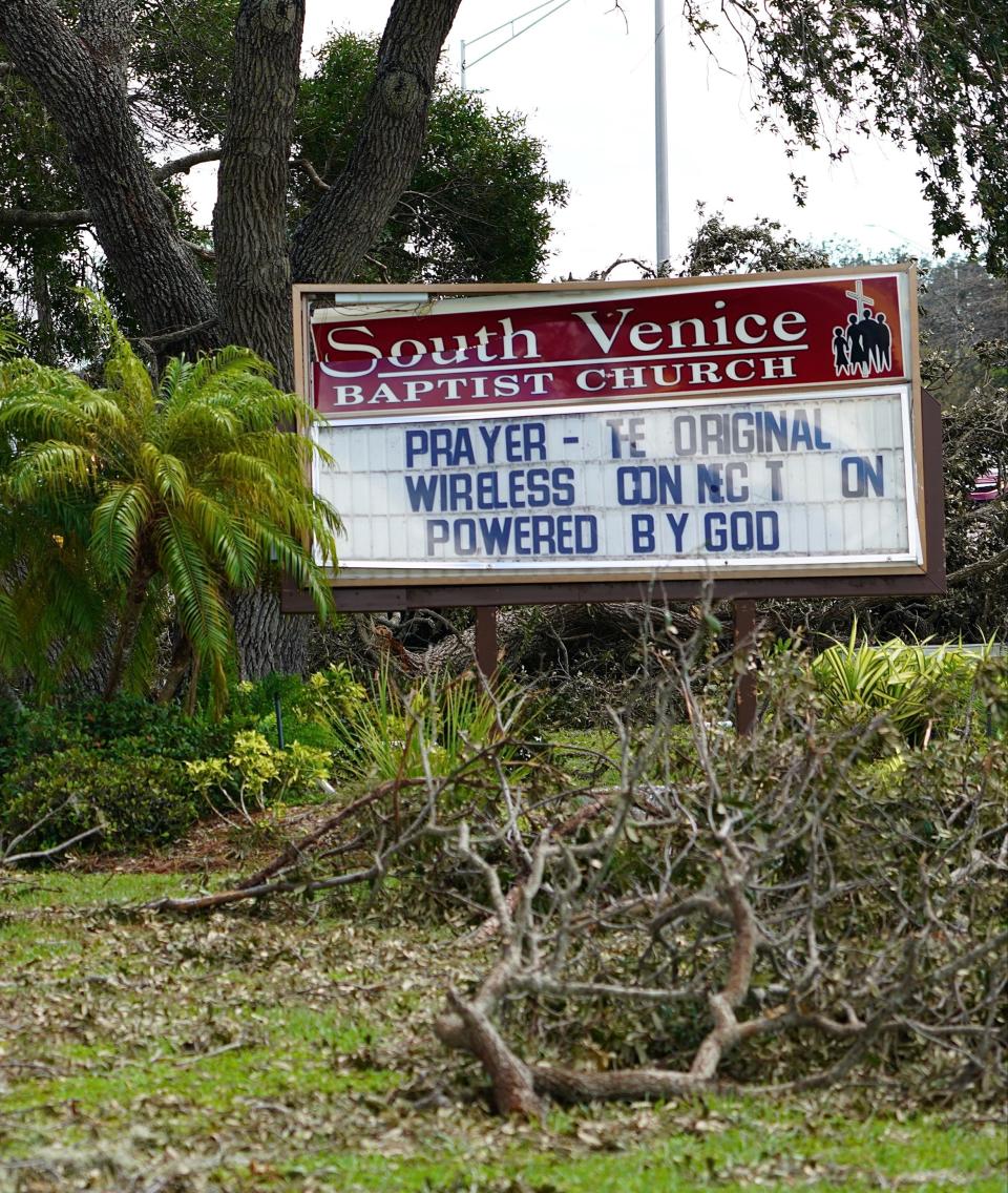 A damaged church sign offers a prophetic message, in hindsight, following the destruction of Hurricane Ian, which knocked out cellphone service in the area.