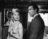 Daniela Bianchi and Sean Connery in a cargo train in a scene from the film 'James Bond: From Russia With Love', 1963. (Photo by United Artist/Getty Images)