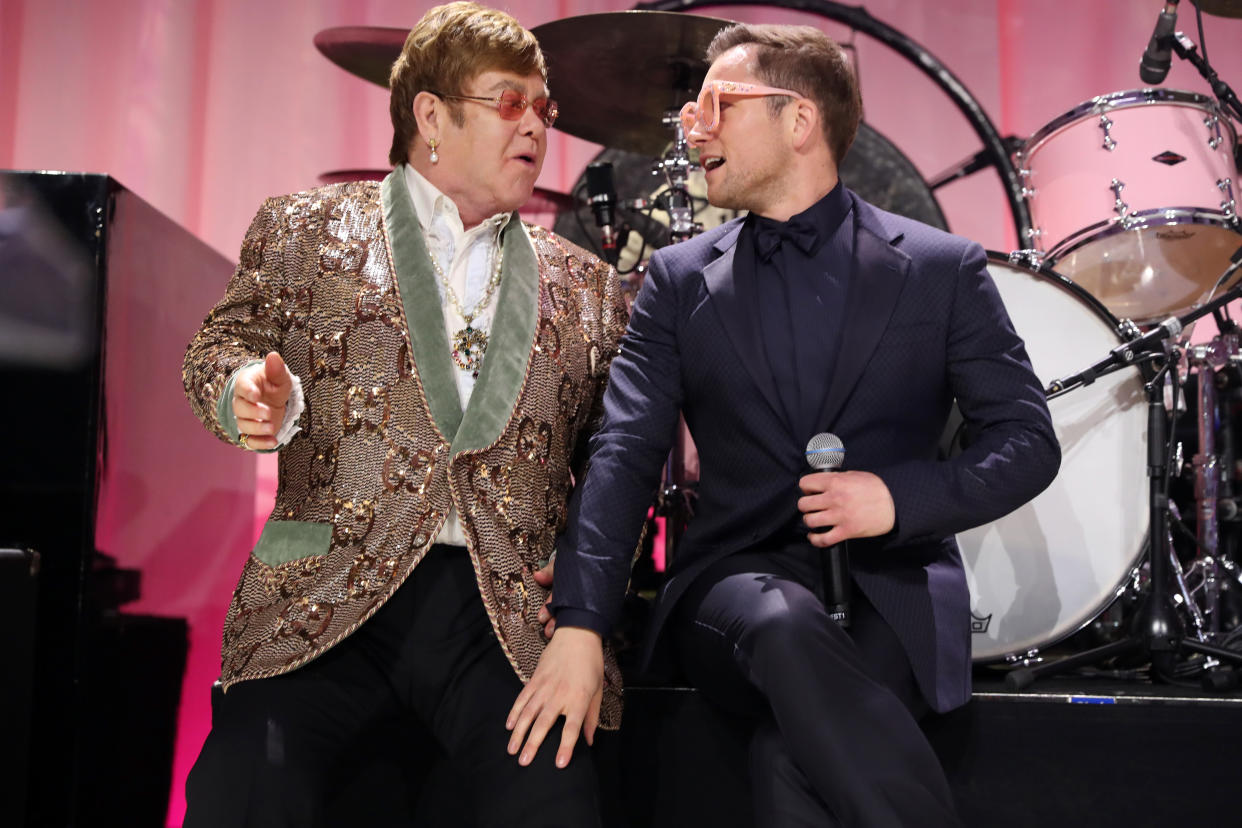 WEST HOLLYWOOD, CA – FEBRUARY 24: Sir Elton John and Taron Egerton perform onstage during the 27th annual Elton John AIDS Foundation Academy Awards Viewing Party sponsored by IMDb and Neuro Drinks celebrating EJAF and the 91st Academy Awards on February 24, 2019 in West Hollywood,California. (Photo by Rich Fury/Getty Images for EJAF)