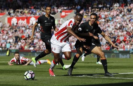 Britain Football Soccer - Stoke City v Liverpool - Premier League - bet365 Stadium - 8/4/17 Stoke City's Saido Berahino in action with Liverpool's Trent Alexander-Arnold Reuters / Darren Staples Livepic