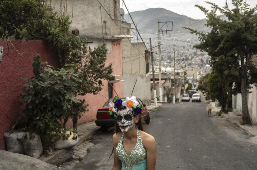 A woman walks on a street