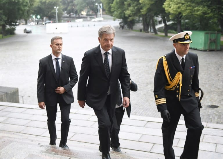 President of Finland Sauli Niinisto (C) arrives for the prayer service at the Turku Cathedral for the victims of Friday's stabbings in Turku, Finland where several people were stabbed on August 18, 2017